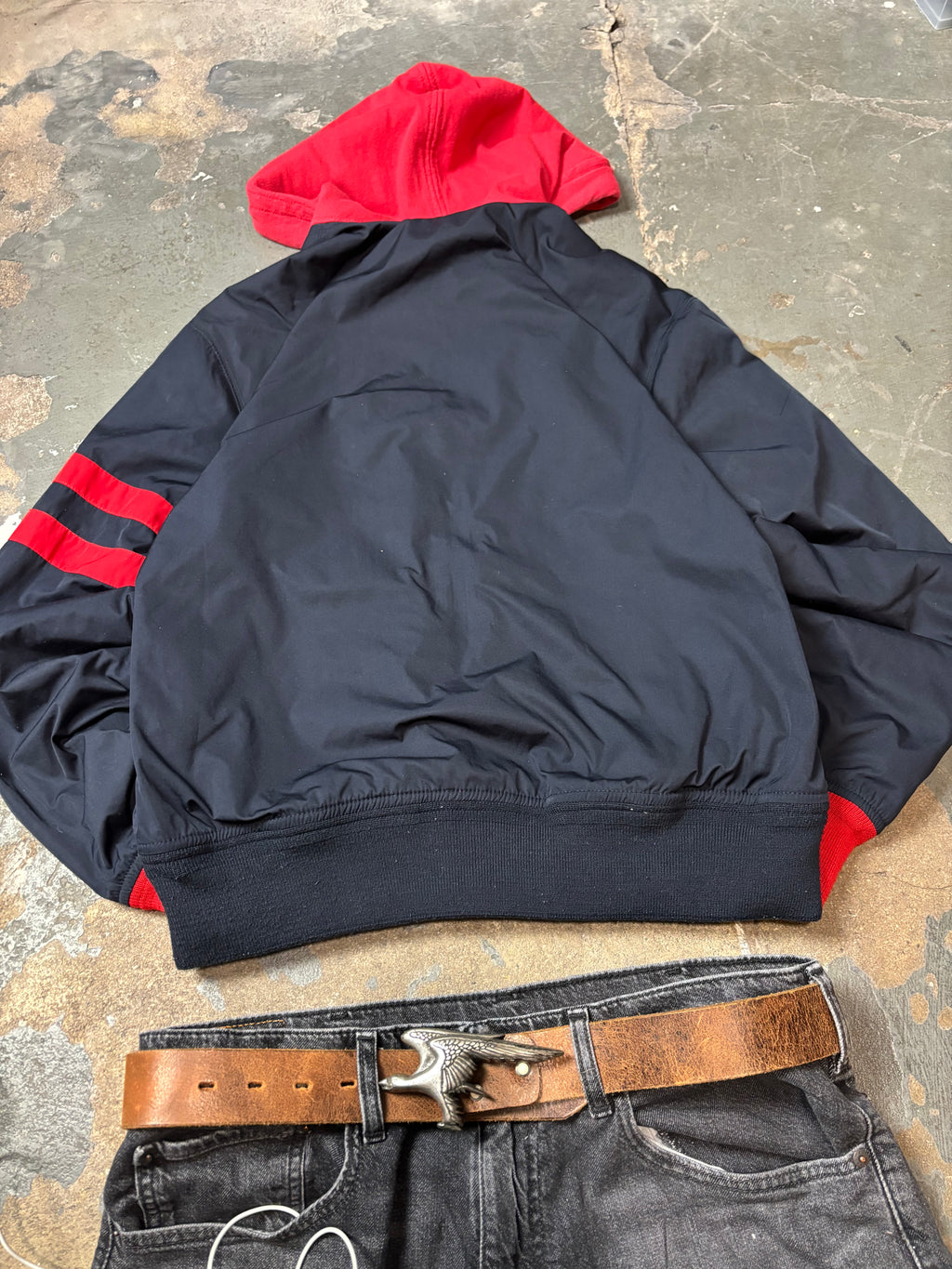 Rückseite der boxy Vintage Polo Ralph Lauren Team USA Kapuzenjacke in Navy mit roten Ärmel-Details